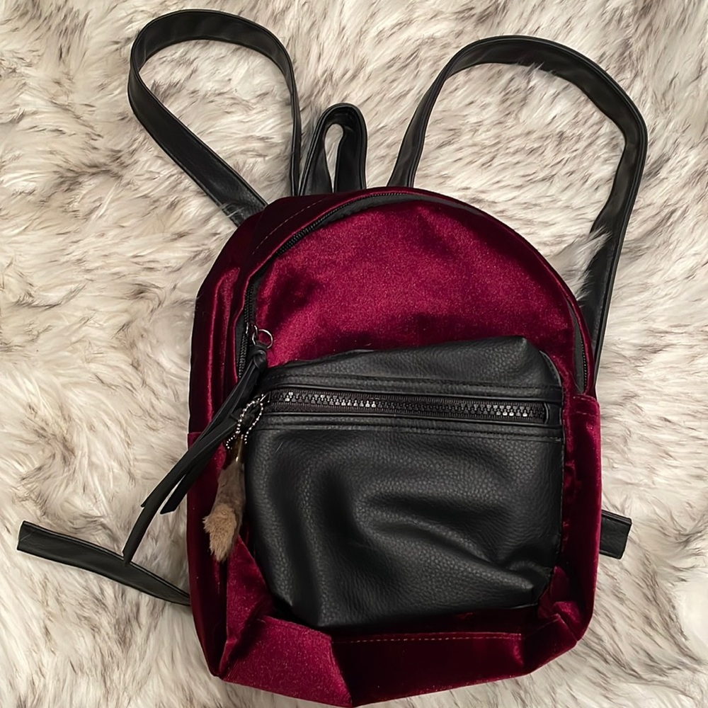 🎒Small Backpack🎒in burgundy red velvet/valour with lucky rabbit’s foot!